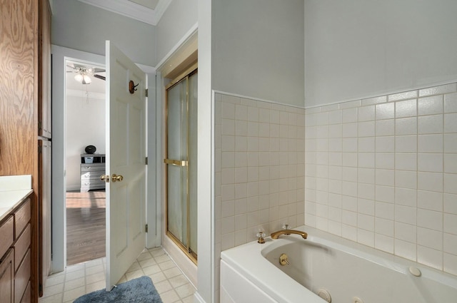 bathroom with vanity, hardwood / wood-style flooring, ceiling fan, ornamental molding, and shower with separate bathtub