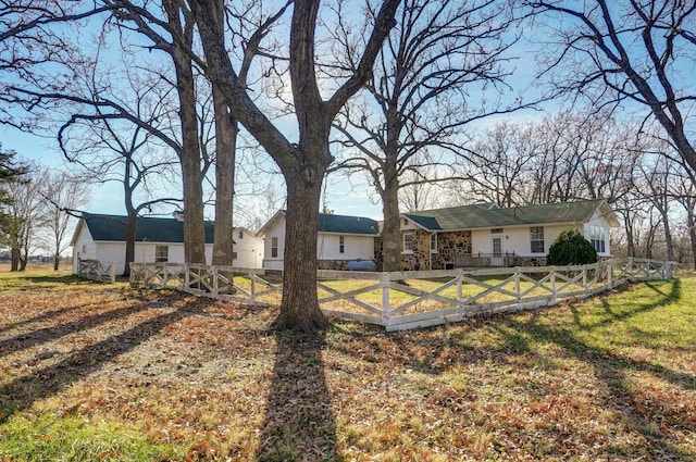 view of front of home with a front yard