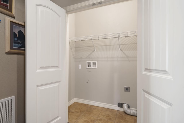 laundry room with washer hookup, electric dryer hookup, and light tile patterned flooring