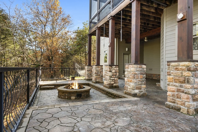 view of patio featuring an outdoor fire pit