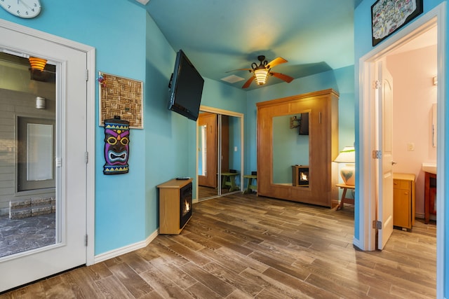 corridor featuring hardwood / wood-style flooring