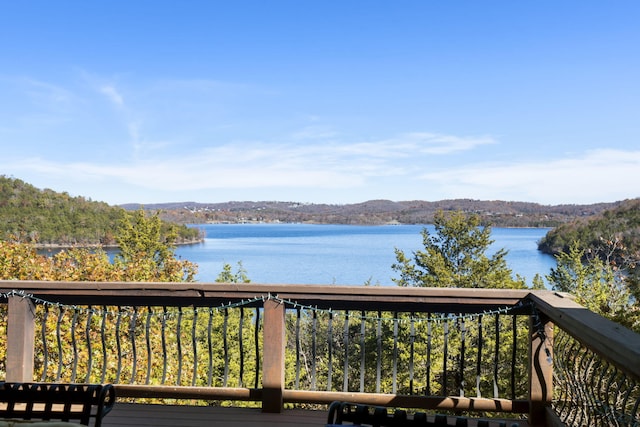 deck featuring a water view