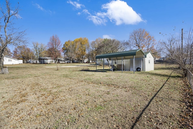 view of yard with a carport