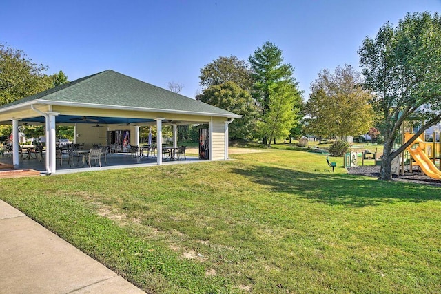 570 Abby Ln Unit 3, Branson, MO 65616 - view of green lawn featuring ceiling fan and a patio area