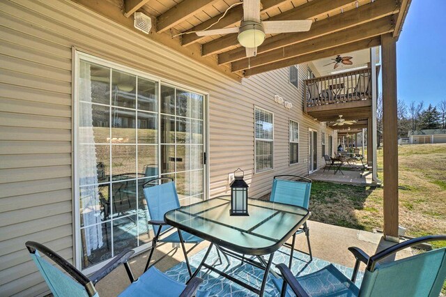 570 Abby Ln Unit 3, Branson, MO 65616 - view of patio / terrace with a ceiling fan, a balcony, and outdoor dining space