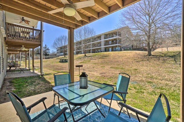 570 Abby Ln Unit 3, Branson, MO 65616 - view of patio / terrace featuring ceiling fan, a balcony, and outdoor dining space