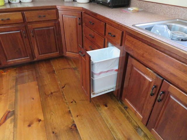 kitchen featuring dark hardwood / wood-style floors and sink