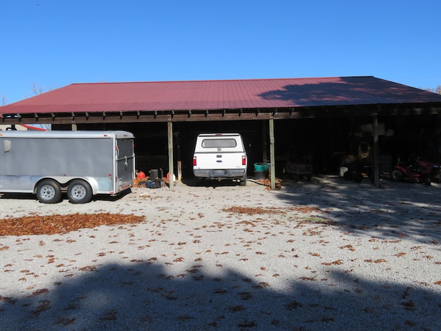 garage featuring a carport