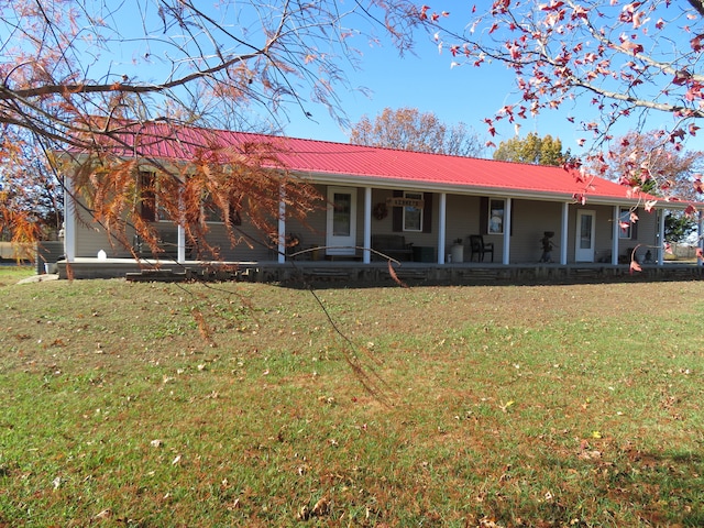 ranch-style home featuring a front yard