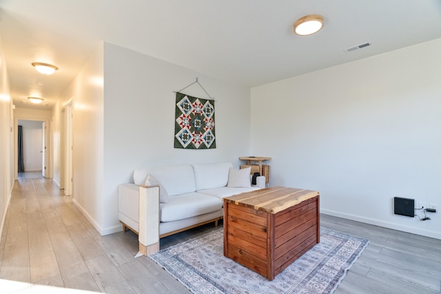 living room with wood-type flooring