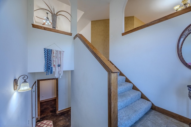 staircase with tile patterned flooring