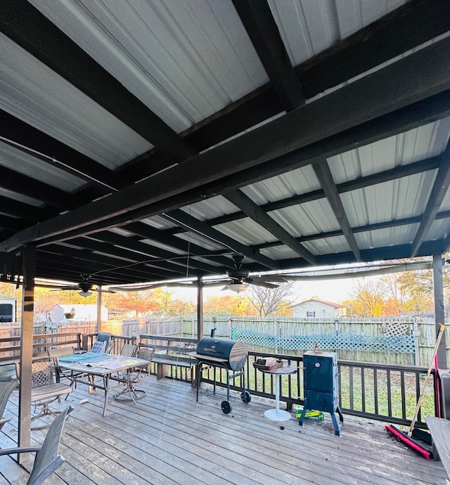 wooden terrace featuring ceiling fan