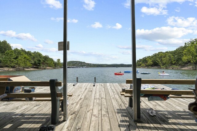 view of dock with a water view