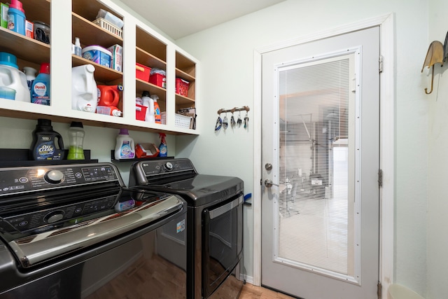 laundry room featuring separate washer and dryer