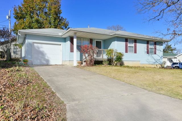 single story home with a front yard and a garage