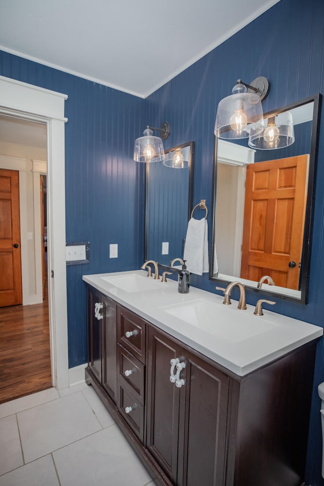 bathroom with hardwood / wood-style floors and vanity