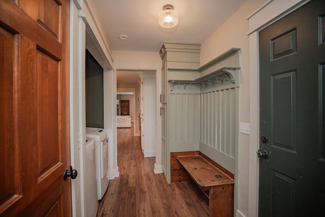 mudroom featuring washing machine and dryer and dark hardwood / wood-style floors