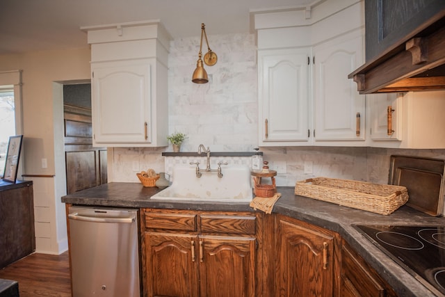 kitchen featuring dishwasher, dark hardwood / wood-style floors, white cabinetry, and sink