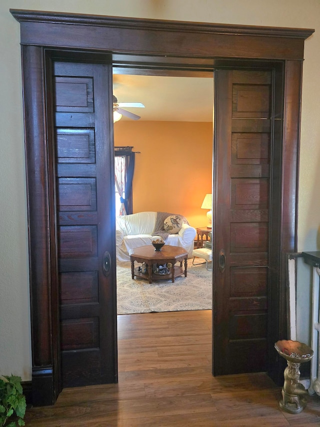 hall featuring dark wood-type flooring