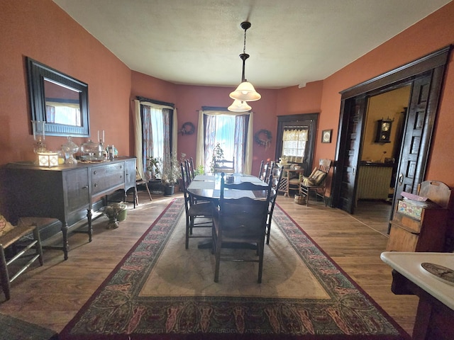 106 N Main St, Greenfield, MO 65661 - dining space featuring wood finished floors