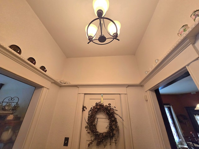 interior details with an inviting chandelier