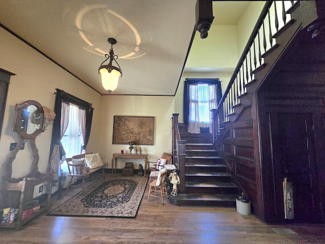 106 N Main St, Greenfield, MO 65661 - foyer featuring stairs and wood finished floors