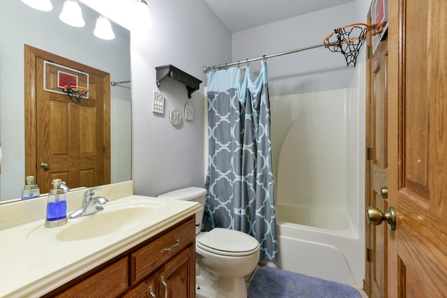 full bathroom featuring shower / bath combination with curtain, toilet, and vanity