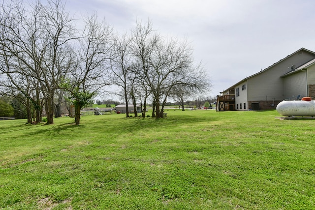 view of yard with a deck