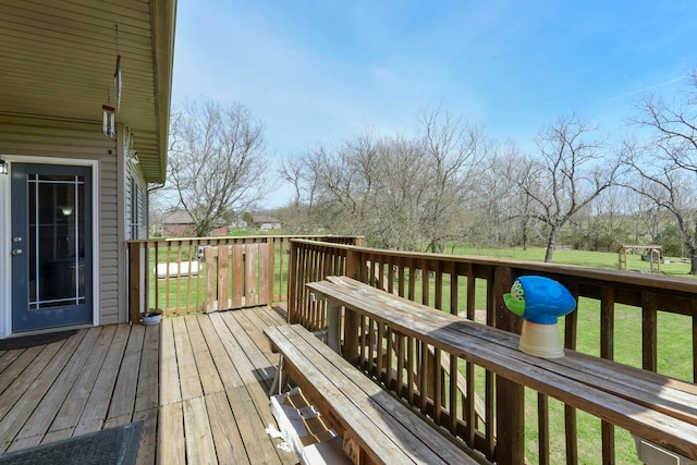 deck featuring a lawn