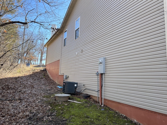 5058 Greenwood Dr, Merriam Woods, MO 65740 - view of side of home featuring a central air condition unit