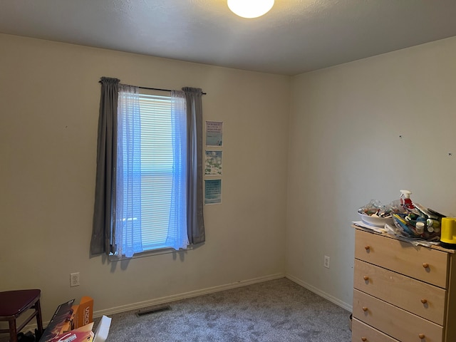 unfurnished bedroom with light carpet