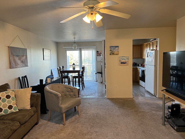 living room with carpet and ceiling fan