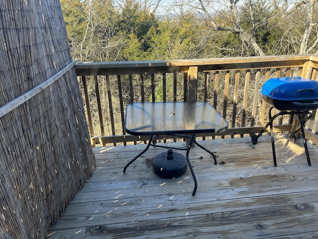 5058 Greenwood Dr, Merriam Woods, MO 65740 - wooden terrace with grilling area and outdoor dining area