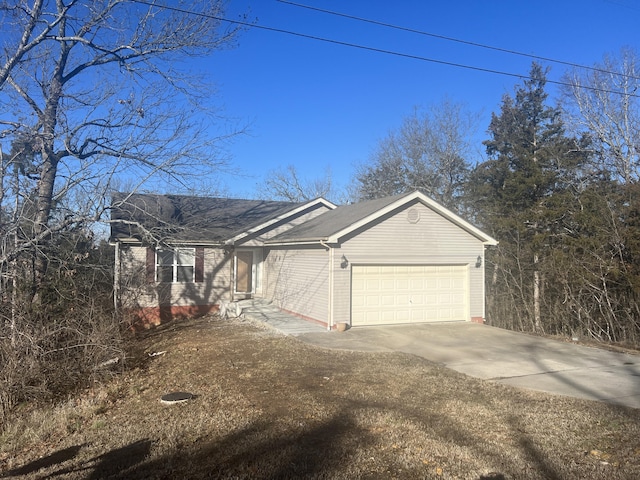 5058 Greenwood Dr, Merriam Woods, MO 65740 - view of property exterior with driveway, an attached garage, and roof with shingles