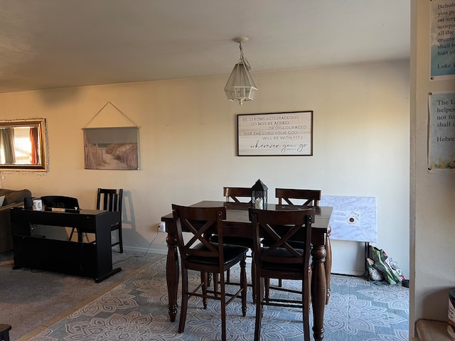 view of carpeted dining room