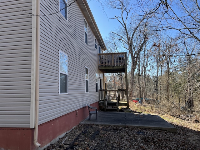 5058 Greenwood Dr, Merriam Woods, MO 65740 - view of property exterior with a balcony, a patio area, and a wooden deck