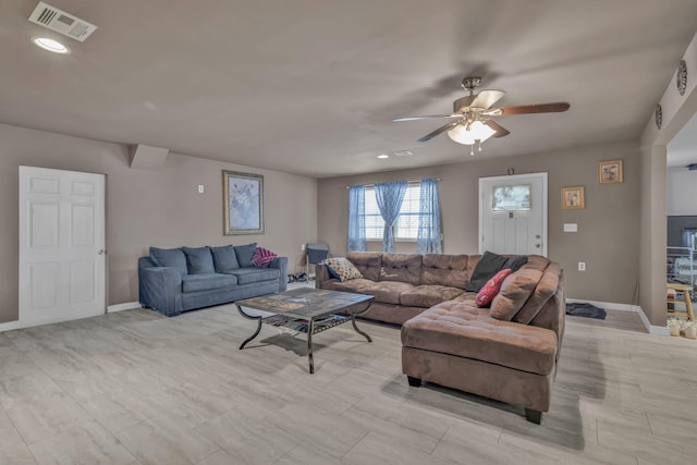 living room with ceiling fan