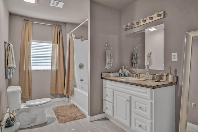 full bathroom with vanity, toilet, and shower / bath combo with shower curtain