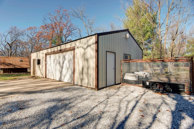 view of outbuilding featuring a garage