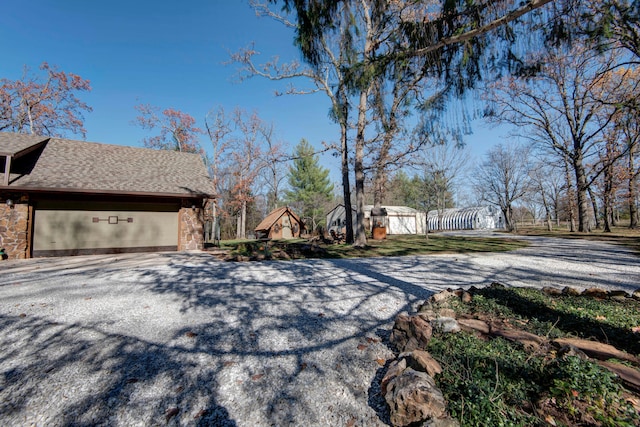 view of property exterior with a garage