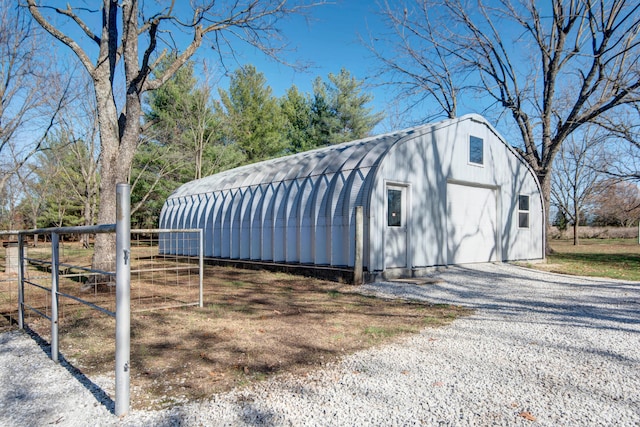 view of outdoor structure with a garage