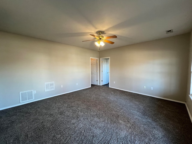 carpeted empty room featuring ceiling fan