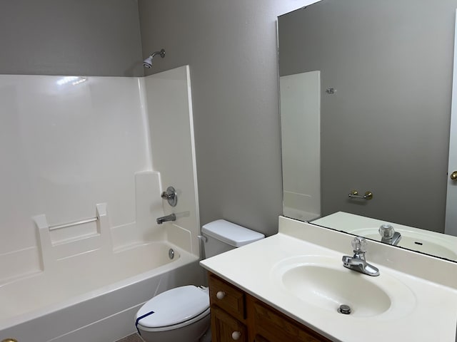 full bathroom featuring vanity, shower / bathtub combination, and toilet