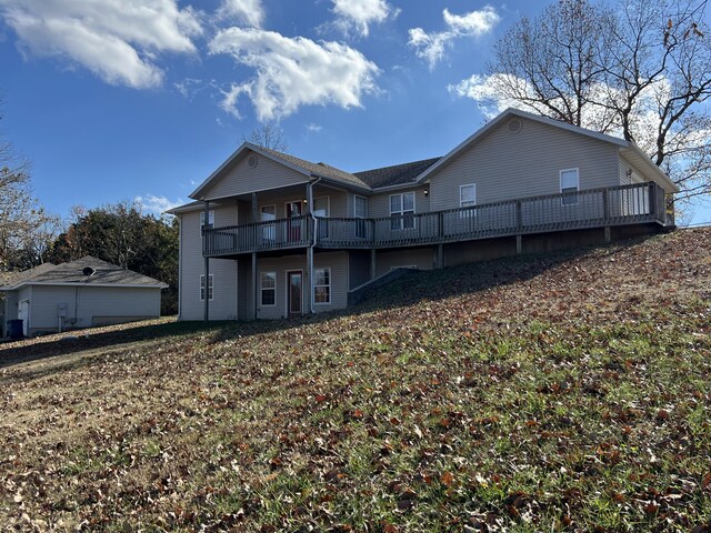 66 Celebration Dr, Reeds Spring, MO 65737 - back of property featuring a deck