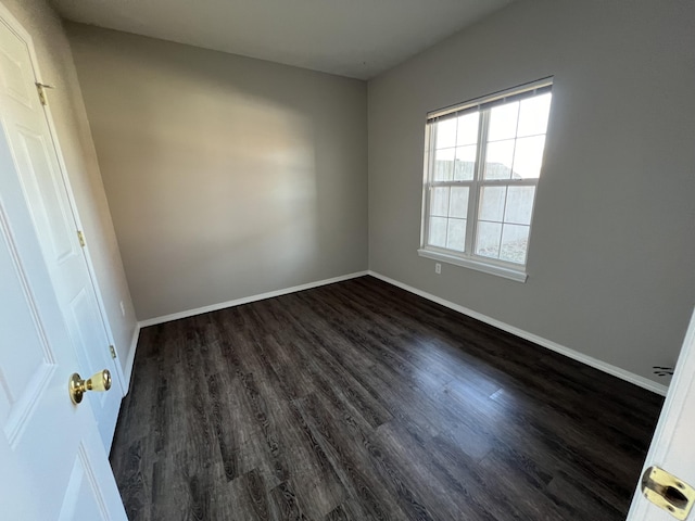66 Celebration Dr, Reeds Spring, MO 65737 - unfurnished room with dark wood-style flooring and baseboards