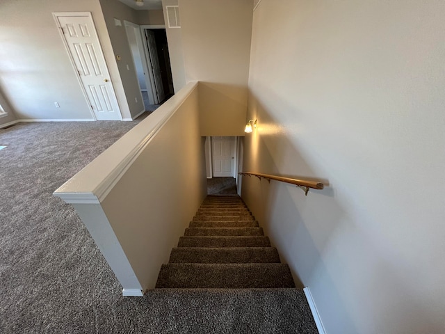 stairway with carpet floors