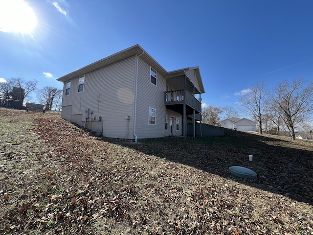 66 Celebration Dr, Reeds Spring, MO 65737 - rear view of property with a balcony