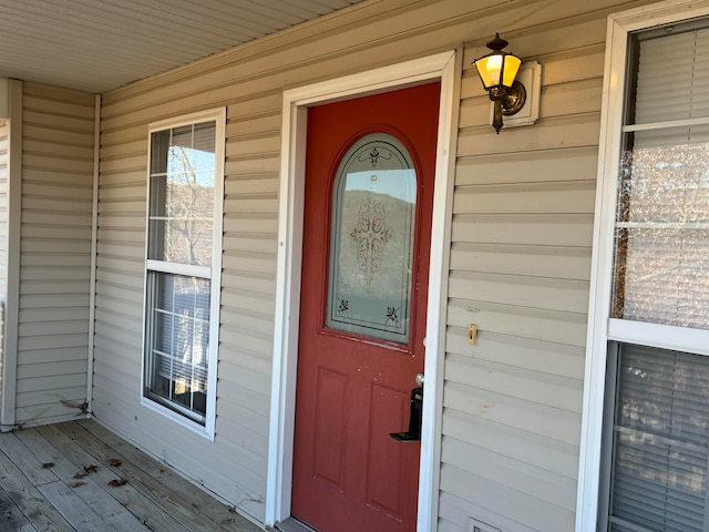 doorway to property featuring a porch