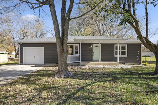 ranch-style house featuring a front lawn, a porch, and a garage