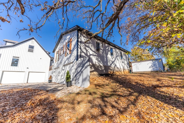 view of property exterior with a garage